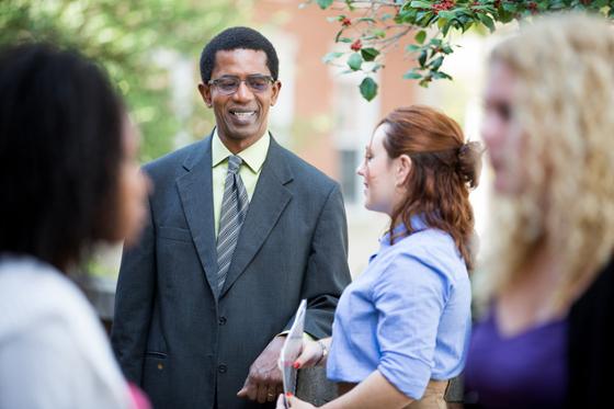 Photo of Chatham University community members talking to one another outside